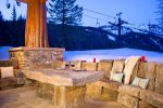 Take in the views and relax in the oversized in-ground hot tub.